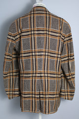 Men's vintage 1960's The Squire Shop long sleeve wool plaid print blazer with a two button closure and double lapel. Plaid print is various shades of brown.