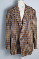 Men's vintage 1970's Varsity Town by Seinsheimer label long sleeve two button closure checkered blazer in brown, tan, and blue wool.