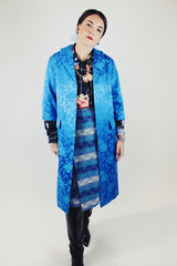 blue satin evening jacket with double lapel and no closure with floral print vintage 1960's