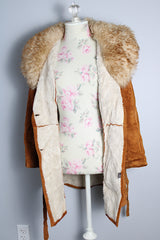 Women's vintage 1970's Leatherscapade, Made in Argentina label long sleeve brown orange genuine leather suede coat with faux fur trim and shearling liner with matching tie belt.