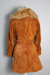 Women's vintage 1970's Leatherscapade, Made in Argentina label long sleeve brown orange genuine leather suede coat with faux fur trim and shearling liner with matching tie belt.