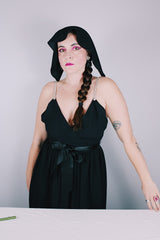 Women's vintage 1980's Morton Myles LTD., Union Made, Made in USA sleeveless rhinestone strap black midi length dress with V shaped neckline and ribbon tie belt.