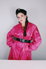 Women's vintage 1980's Windsor Bay long sleeve long length bright pink nylon and polyester button up windbreaker jacket.