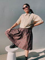 women's vintage 1960's high waisted brown printed pleated midi skirt