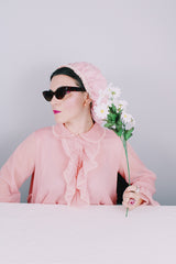 Women's vintage 1970's Hollywood Vassarette by Munsingwear, Made in USA label long sleeve ankle length baby pink nightgown in sheer nylon material.