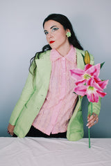 Women's vintage 1960's Saks Alley long sleeve two button closure double lapel blazer in light green and linen material.