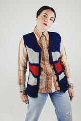 navy knit button up vest with grey and brown suede panels in the front vintage 1970's