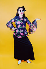 dress with pink floral top half and black bottom bell sleeves and floor length vintage 1970's