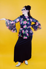 dress with pink floral top half and black bottom bell sleeves and floor length vintage 1970's