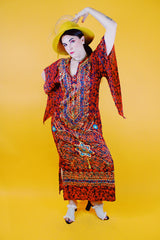 red ankle length tunic dress with embroidery and pointy bell sleeves