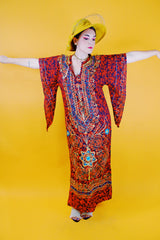 red ankle length tunic dress with embroidery and pointy bell sleeves