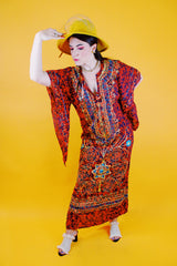 red ankle length tunic dress with embroidery and pointy bell sleeves