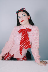 Women's vintage 1970's Lady Arrow label long sleeve white polyester button up blouse with red polka dots. Dagger collar and detachable adjustable tie neck.