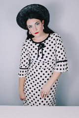 Women's vintage 1960's Gallant California short sleeve white linen dress with black polka dots all over. Has black bow tie on neck.