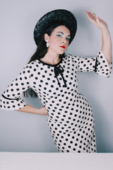 Women's vintage 1960's Gallant California short sleeve white linen dress with black polka dots all over. Has black bow tie on neck.