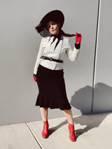 long sleeve white leather 1980's wilsons jacket with black trim and black belt asymmetrical zipper women's vintage