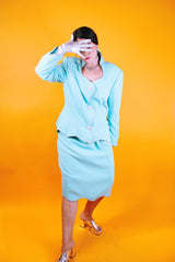 1980's set, teal color, blazer and pencil skirt both with rhinestone trim throughout and rhinestone buttons
