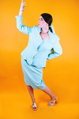 1980's set, teal color, blazer and pencil skirt both with rhinestone trim throughout and rhinestone buttons