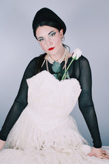 Women's vintage 1950's white lace wedding dress with cream satin bodice and lace overlay. Sweetheart neckline, strapless, zipper in the back.