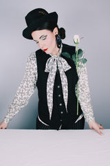 Women's vintage 1980's Evan-Picone, Neiman-Marcus label long sleeve button up. blouse in white polyester material with all over black abstract print.