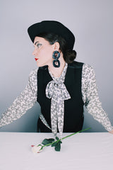 Women's vintage 1980's Evan-Picone, Neiman-Marcus label long sleeve button up. blouse in white polyester material with all over black abstract print.