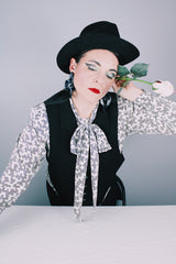 Women's vintage 1980's Evan-Picone, Neiman-Marcus label long sleeve button up. blouse in white polyester material with all over black abstract print.