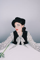 Women's vintage 1980's Evan-Picone, Neiman-Marcus label long sleeve button up. blouse in white polyester material with all over black abstract print.