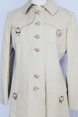 long sleeve knee length light tan trench with gold hardware vintage 1970's saks alley