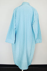 blue long sleeve long length quilted duster jacket with embroidered flowers vintage 1960's