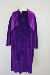 purple velvet coat with 3/4 arm length buttons up the front and attached neck tie vintage women's 1960's