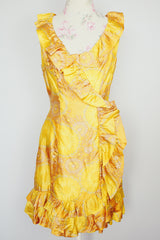 sleeveless knee length floral print yellow dress with ruffle trim vintage 1960s