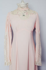 long sleeve light pink maxi dress with crochet lace details and tie belt vintage 1940's