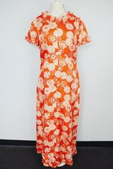 short sleeve maxi length orange printed dress with ruffle trim vintage 1970's