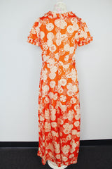 short sleeve maxi length orange printed dress with ruffle trim vintage 1970's