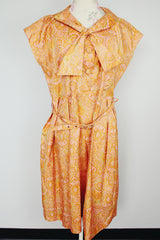short sleeve midi length orange and pink paisley print a line dress vintage 1950's