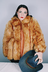 Women's vintage 1970's Designer Originals, Dino Ricco label long sleeve zip up tan brown faux fur jacket with rounded collar and side pockets.
