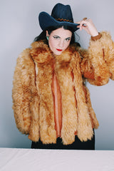 Women's vintage 1970's Designer Originals, Dino Ricco label long sleeve zip up tan brown faux fur jacket with rounded collar and side pockets.