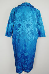 blue satin evening jacket with double lapel and no closure with floral print vintage 1960's