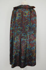 1960's reversible poncho with buttons and collar one side is gold one side is floral print vintage