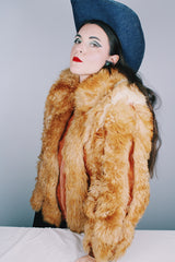 Women's vintage 1970's Designer Originals, Dino Ricco label long sleeve zip up tan brown faux fur jacket with rounded collar and side pockets.