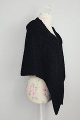 textured boucle black shawl with one closure longer in the front vintage 1940's