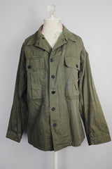 long sleeve green army jacket buttons up with two chest pockets vintage