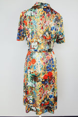 all over floral print short sleeve knee length dress with front half zipper and matching tie belt vintage 1970's