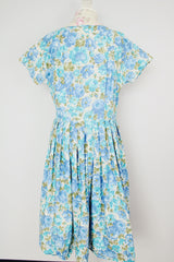 short sleeve blue floral print midi length dress with a line structure women's vintage 1960's