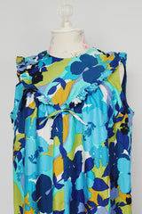 sleeveless floral printed maxi dress with ruffle and bow trim vintage 1960's