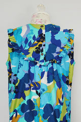 sleeveless floral printed maxi dress with ruffle and bow trim vintage 1960's