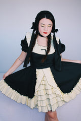 Women's vintage 1970's SaSabobs label two piece top and skirt set square dance costume in black and white.