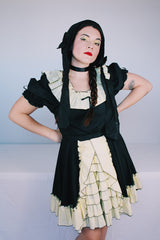 Women's vintage 1970's SaSabobs label two piece top and skirt set square dance costume in black and white.