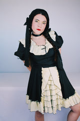 Women's vintage 1970's SaSabobs label two piece top and skirt set square dance costume in black and white.
