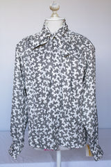 Women's vintage 1980's Evan-Picone, Neiman-Marcus label long sleeve button up. blouse in white polyester material with all over black abstract print.